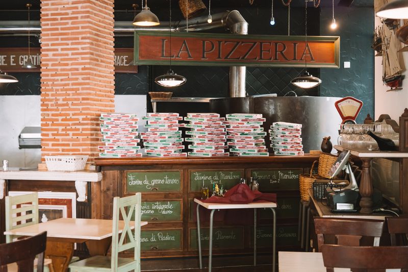 Jet's pizza kitchen team preparing fresh jet's pizza