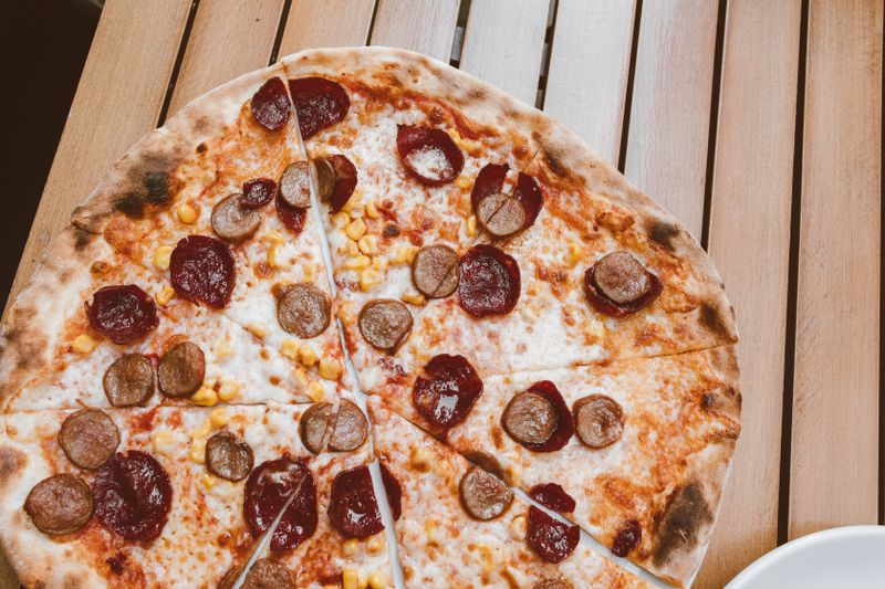 Veggie Supreme pizza with bell peppers mushrooms and olives